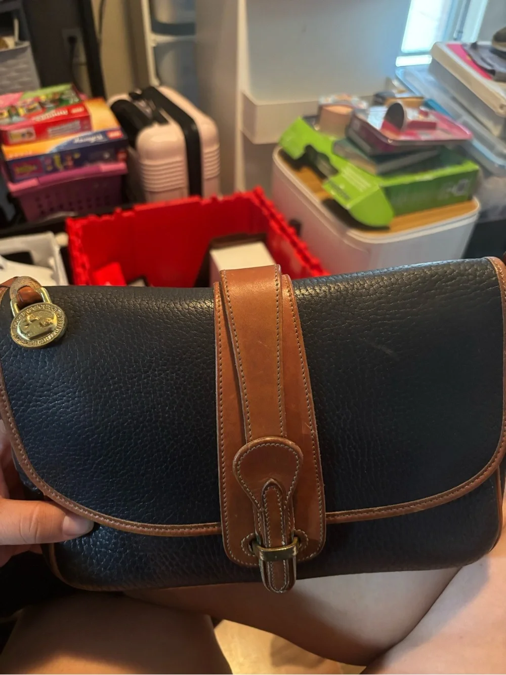 Dooney & Bourke Black Pebbled Leather Clutch with Brown Trim